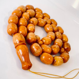 Discover timeless elegance: Vintage Natural Pressed German Amber Islamic Prayer Beads 82 grams