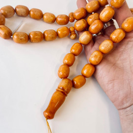 Discover timeless elegance: Vintage Natural Pressed German Amber Islamic Prayer Beads 82 grams