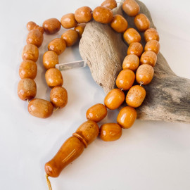 Discover timeless elegance: Vintage Natural Pressed German Amber Islamic Prayer Beads 82 grams