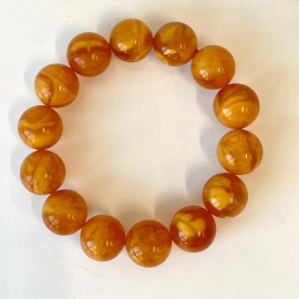 سوار بوهو شيك عنبر وردي-برتقالي: مجوهرات مصنوعة يدوياً فريدة من نوعها مع العنبر الطبيعي