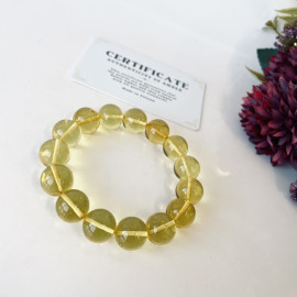 سوار بوهو شيك عنبر وردي-برتقالي: مجوهرات مصنوعة يدوياً فريدة من نوعها مع العنبر الطبيعي