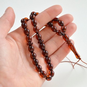 Misbaha Islam Rosary of Genuine Baltic Amber 11 grams Cognac Color 10 x 7.5 mm Beads